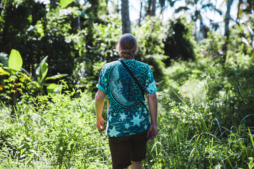 Green t-shirt with The Band graphic